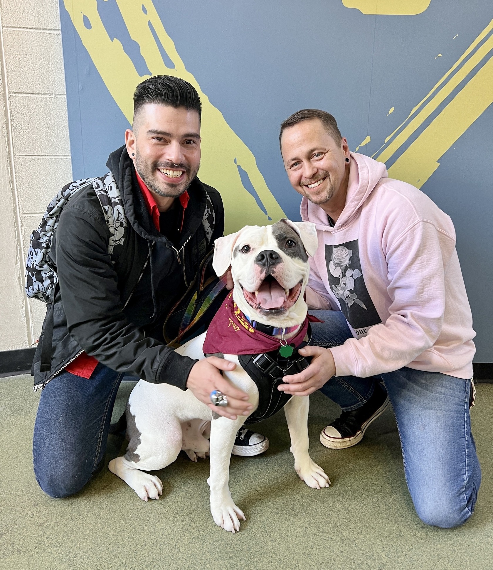 happy men with dog posing