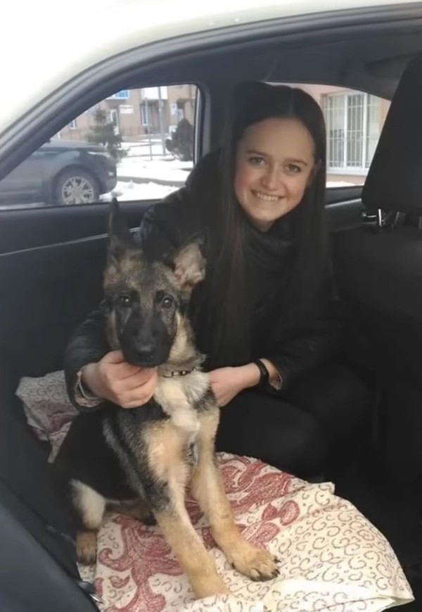 young lady and german shepherd