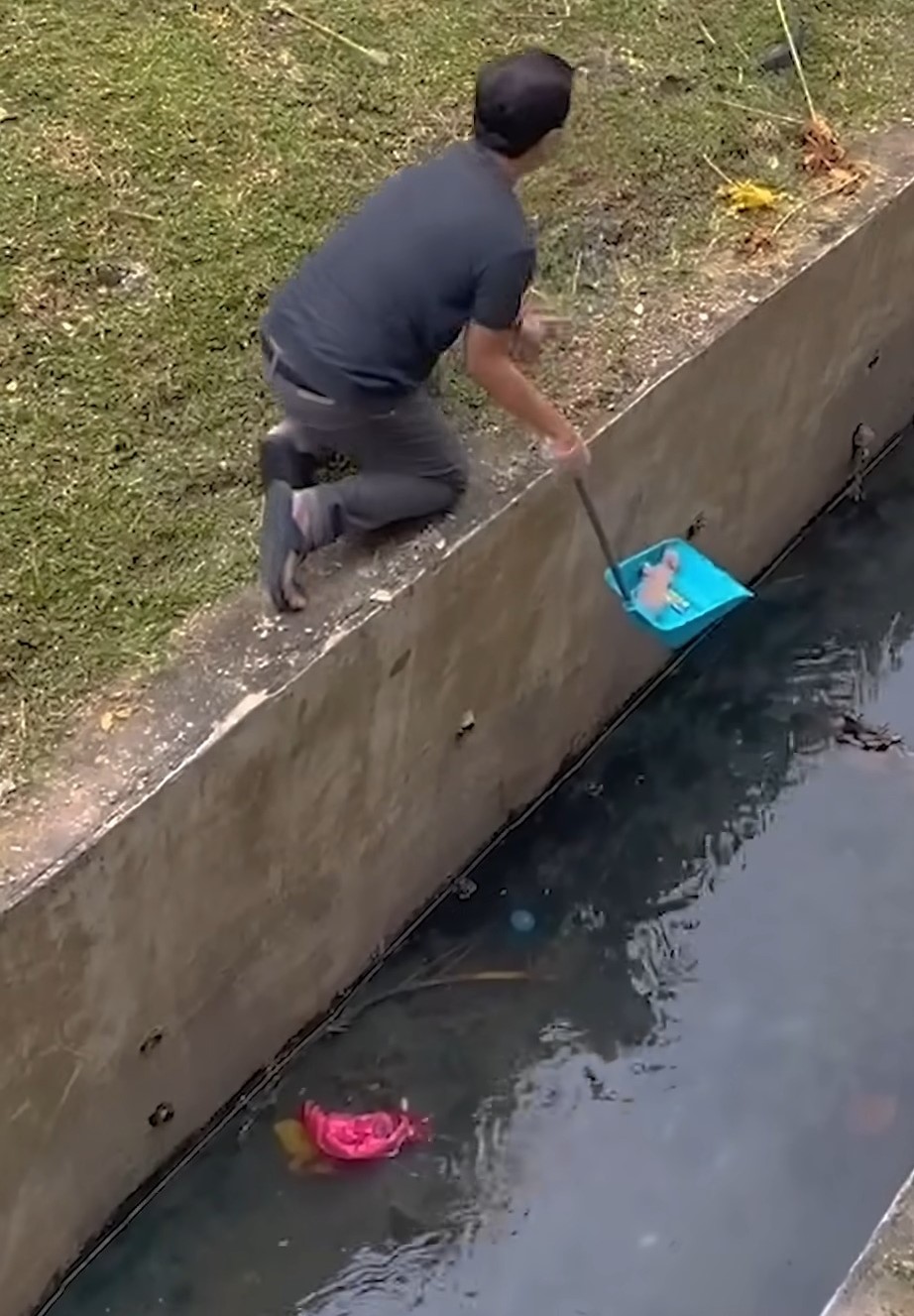 man saving a puppy