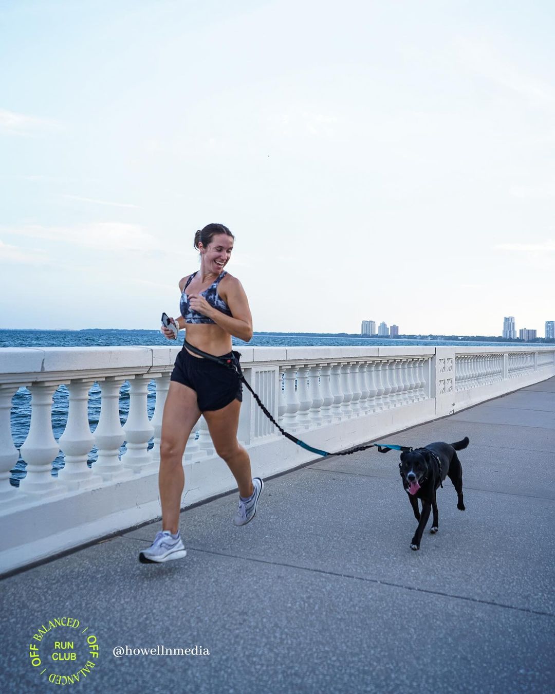 woman jogging with dog